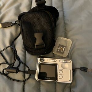 Fujifilm Silver FinePix Point-and-Shoot Camera with Black Case